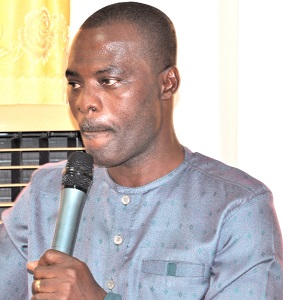 Emmanuel Lumor, the ECG Volta Regional General Manager, addressing the municipal and district chief executives during the meeting 